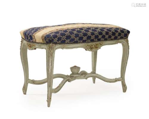 An Louis XV-style carved and painted wood bench