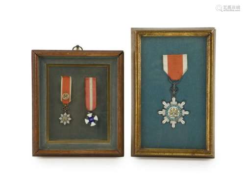 Two framed commemorative medals