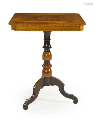 A marquetry tripod table