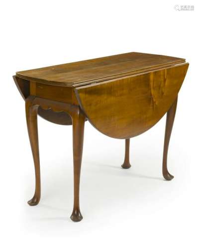 A Queen Anne-style drop leaf table