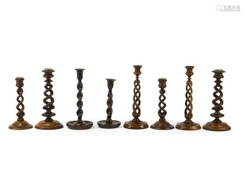 Eight English treen candlesticks