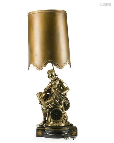 A bronze figural clock/lamp