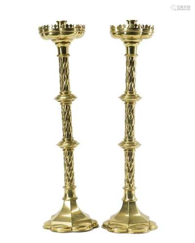 A pair of brass pricket sticks