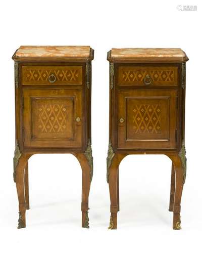 A pair of French bedside tables