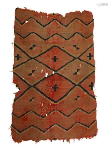 A framed Navajo textile fragment