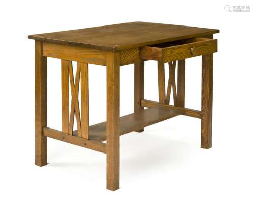 An Arts & Crafts-style oak desk