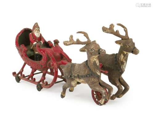 A Santa with reindeer cast iron toy