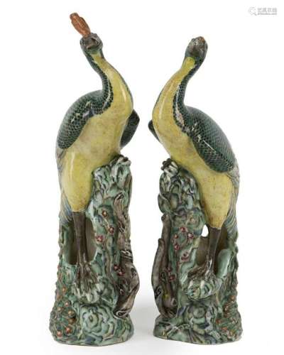 A pair of Asian glazed peacocks