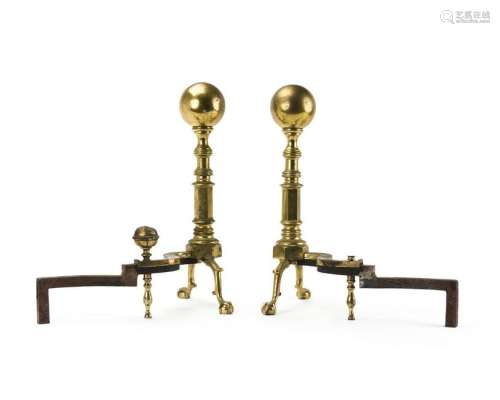 A pair of brass andirons