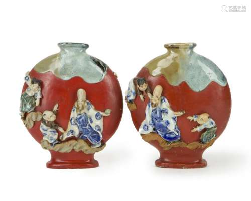 A pair of Sumida Ware moon vases