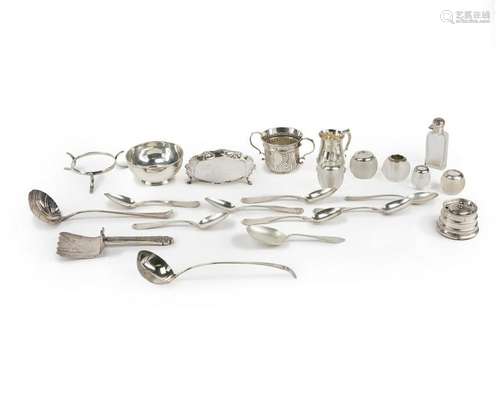 A group of silver table items