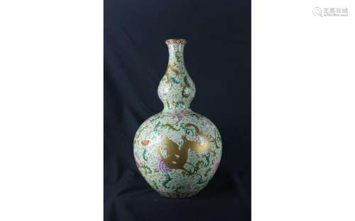 A Green-Ground Famille Rose Double Gourd Porcelain Vase