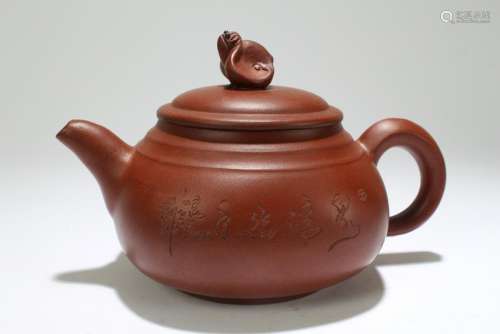 A Chinese Circular Myth-beast Tea Pot Display