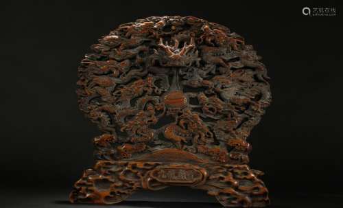 A Chinese Nine-dragon Fortune Curving Wooden Statue