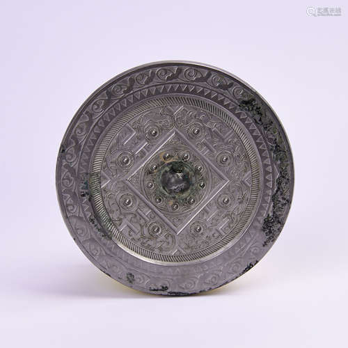 A Chinese Bronze Mirror