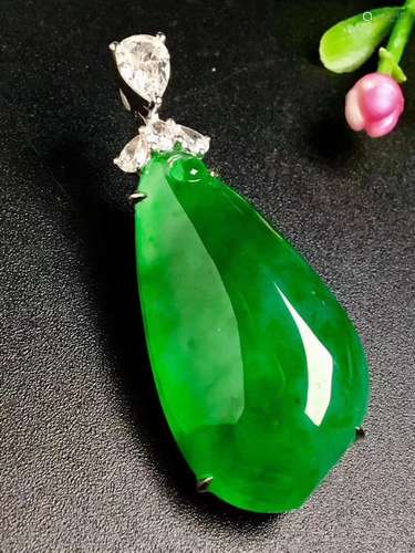 A Chinese Carved Jadeite Pendant