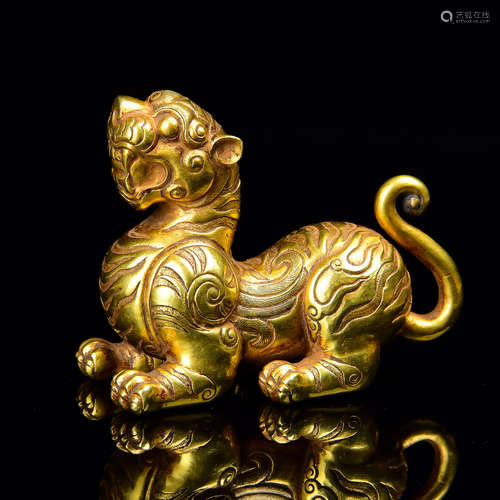 A Chinese Gold Foo-Dog