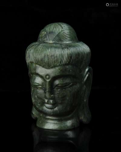 A Chinese Carved Jade Buddha Head
