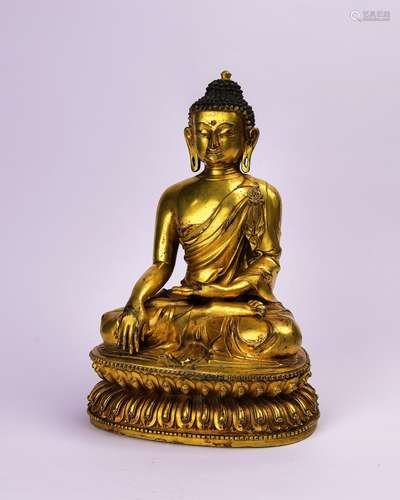 A Chinese Gilt Bronze Buddha