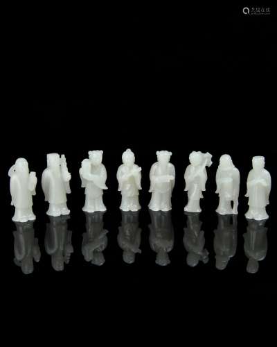 A Set of Eight Chinese Carved Jade Figures