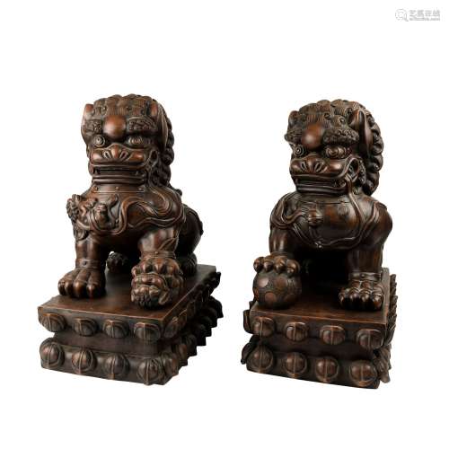 A Pair of Chinese Carved Yixing Clay Foo-Dogs
