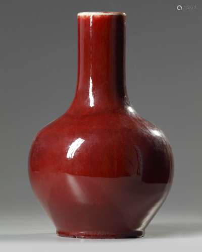 A Chinese red glazed bottle vase