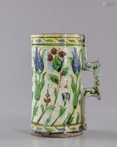 An Ottoman iznik pottery tankard