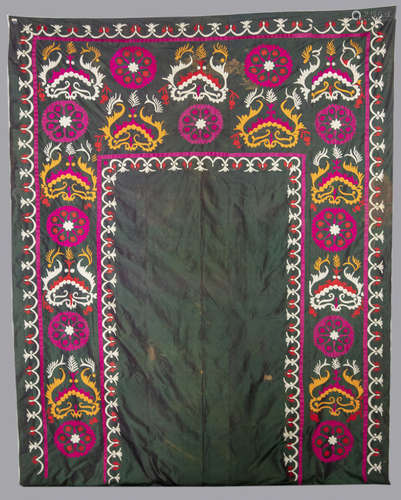 A green suzani embroidery