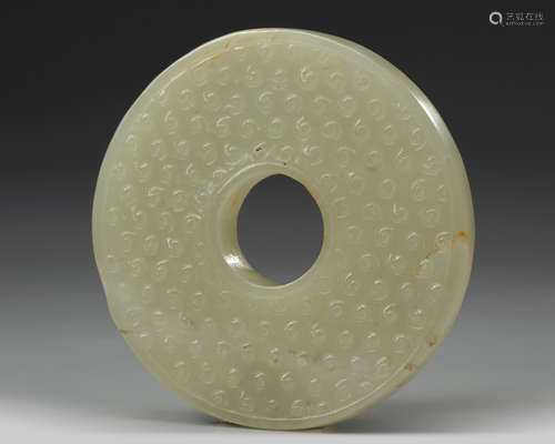 A jade carving of a bi disc