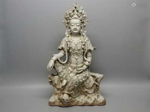 A Chinese White Glazed Porcelain Buddha