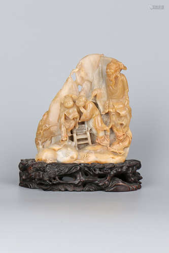 A Chinese Carved Shoushan Decoration with Stand