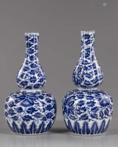 Two Chinese blue and white double-gourd vases