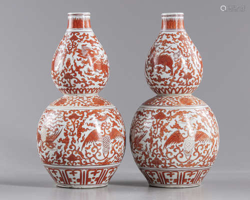 A Chinese iron-red double gourd vase