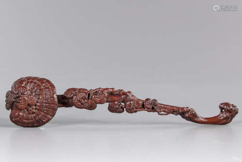 A Chinese wood carved Ruyi sceptre