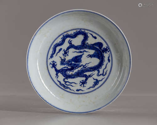 A Chinese blue and white dragon dish