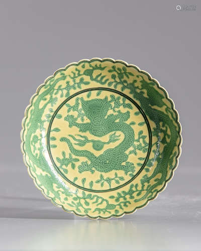 A Chinese dragon  yellow ground saucer