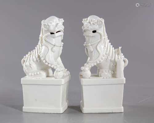 A pair of Chinese blanc-de-Chine buddhist lions