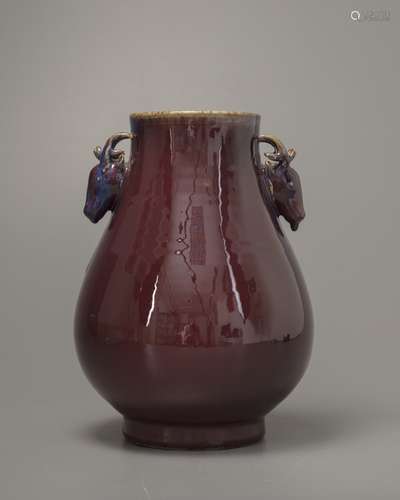 A Chinese flambé-glazed deer-handled vase. Hu