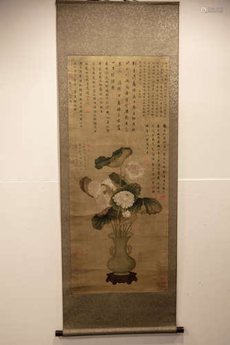 A Chinese hanging scroll depicting a vase with flowers and Chinese calligraphy