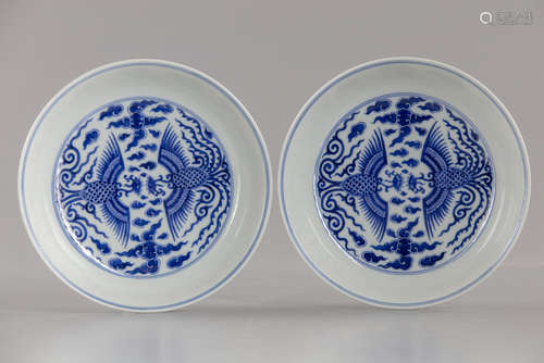 A pair of Chinese blue and white 'phoenix' dishes