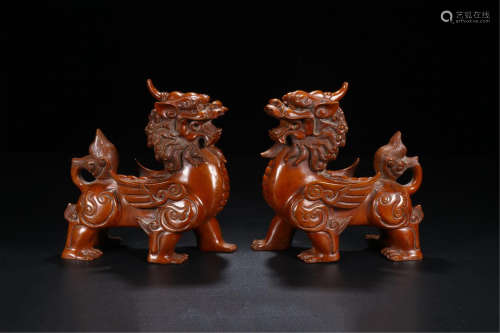 PAIR OF CHINESE BOXWOOD LION TABLE ITEMS