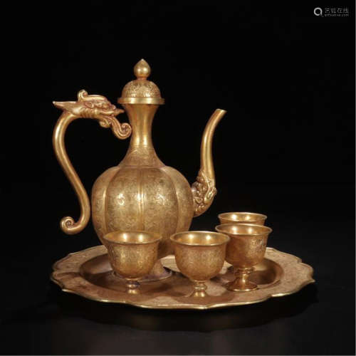 CHINESE GILT BRONZE WINE KETTLE WITH FOUR CUPS
