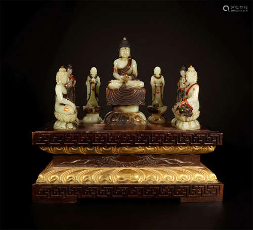 SEVEN CHINESE WHITE JADE SEATED BUDDHA ON BOXWOOD BASE