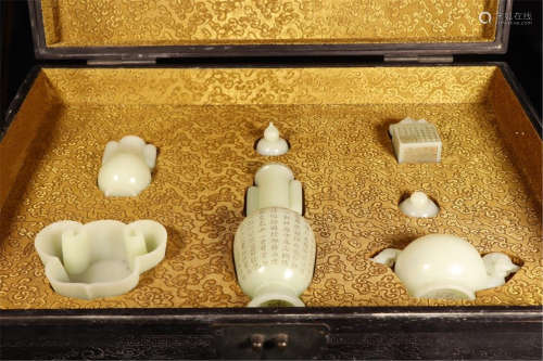 SEVEN CHINESE WHITE JADE CRAVING COLLECTION IN ROSEWOOD CASE