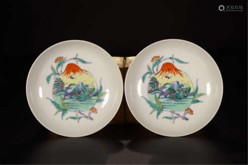 PAIR OF CHINESE PORCELAIN DOUCAI PEACH PLATES