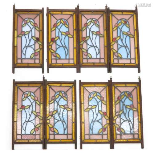 A Collection of Eight Art Nouveau Stained Glass Wi…