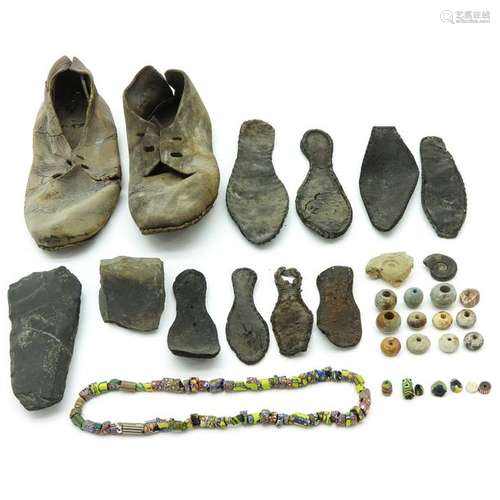 A Diverse Lot of Antique Shoes and Pottery Beads