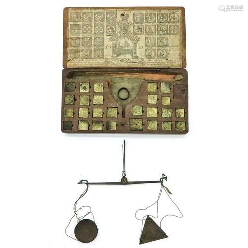 An Antique Scale in Box with Weights