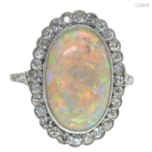 A Ladies Opal and Diamond Ring