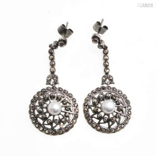 A Pair of Diamond and Pearl Earrings Set in Silver